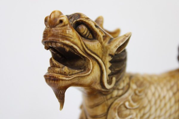 Kiniškos Fu šunų dramblio kaulo skulptūros