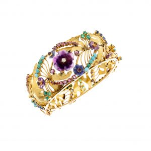 Auksinė Art Nouveau stiliaus apyrankė su deimantais, rubinais, safyrais.